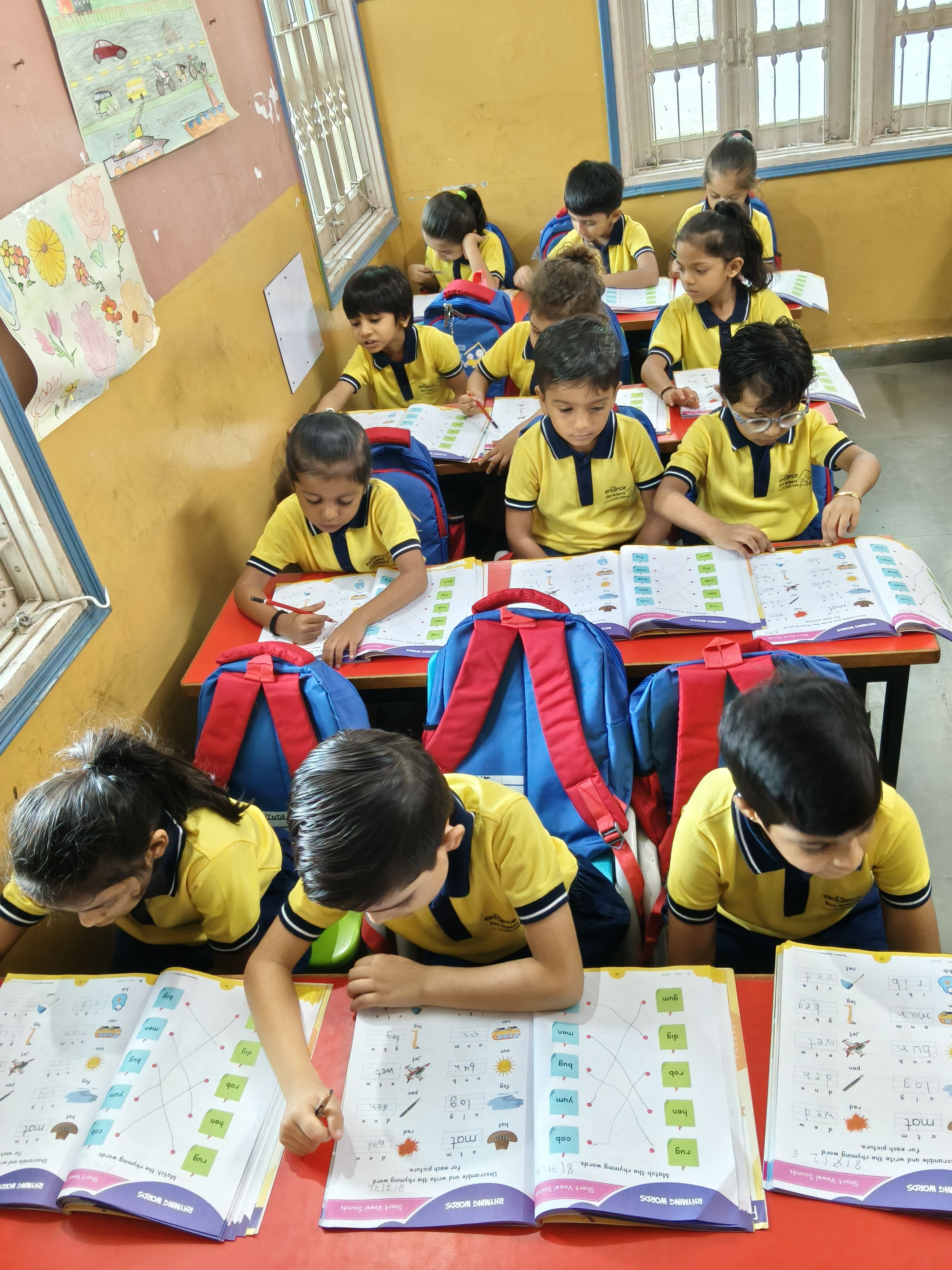 Children doing art and craft activities at Enfance